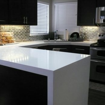 Cadillac Tile - Custom Counter Tops, Granite or Quartz  Waterfall edge, Glass/ Metal / Stone  and Tile /Back splash  installations, Plumbing  installation - Tiling Near Me
