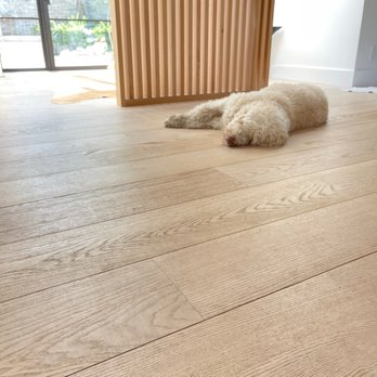 Unique Hardwood - a dog laying on the floor - Flooring Near Me - Costa Mesa, California Unique Hardwood - a dog laying on the floor - Flooring Near Me - Costa Mesa, California