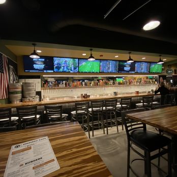 Greg's Kitchen & Taphouse - Look at that bar! So many beers on tap! - American Near Me - Denver, Colorado