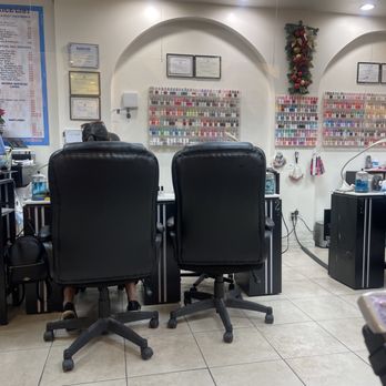 Professio Nails - Christmas decor / price list / nail shelf wall - Nail Salons Near Me - Waipahu, Hawaii