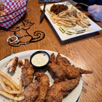 The Ugly Dog Pub - Onion rings, chicken tenders and pulled pork with fries. - New American Near Me - Highlands, North Carolina The Ugly Dog Pub - Onion rings, chicken tenders and pulled pork with fries. - New American Near Me - Highlands, North Carolina
