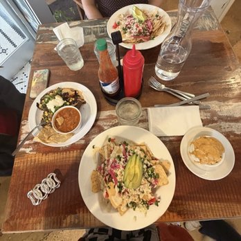 Cashew - Jack fruit nacho in center, side of Mac and cheese on right, chili and sweet potatoes on left - Vegan Near Me - Chattanooga, Tennessee