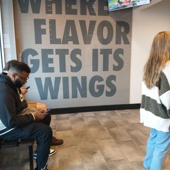 Wingstop - Inside signage - Chicken Wings Near Me - Tampa, Florida