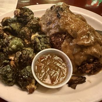 Brazen Head Pub - Special: Pork Schnitzel topped with sautéed 'Shrooms and Onions and a house made brown gravy - Pubs Near Me - West Bend, Wisconsin