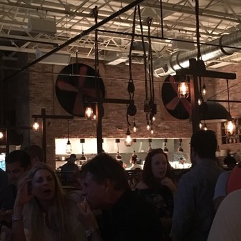 El Camino - Massive wooden wall fans - super effective and beautiful - Cocktail Bars Near Me - Delray Beach, Florida