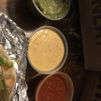 Chipotle Mexican Grill - Side of guacamole, queso (disappointing), and side of hot salsa - Mexican Near Me - Tulsa, Oklahoma Chipotle Mexican Grill - Side of guacamole, queso (disappointing), and side of hot salsa - Mexican Near Me - Tulsa, Oklahoma