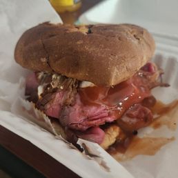 North Shore. Amazing. Shaved roast beef with mayo, BBQ sauce, American cheese, on a pillowy grilled onion roll.