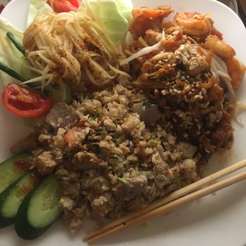 EatzThai - Green Papaya Salad Thai Fried Rice Pad Thai -- after plating from carry out. I have enough to plate at least 3 more servings. Hungry? - Food Delivery Services Near Me - Los Angeles, California