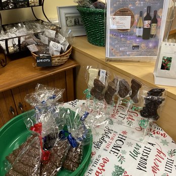 Nutz About Chocolate - a variety of chocolates on a table - Candy Stores Near Me - Lake Orion, Michigan Nutz About Chocolate - a variety of chocolates on a table - Candy Stores Near Me - Lake Orion, Michigan