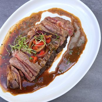 Suspiro - Ribeye y Tacu-Tacu: Ribeye w/ chorrillana sauce, rice-bean patty ($45) - Spanish Near Me - San Jose, California