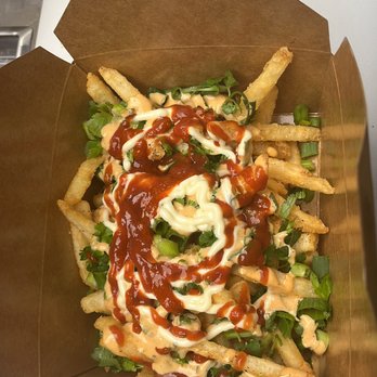 Donair Thyme - a box of fries with ketchup - Donairs Near Me - Vancouver, British Columbia Donair Thyme - a box of fries with ketchup - Donairs Near Me - Vancouver, British Columbia
