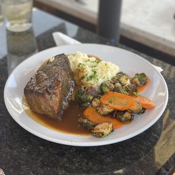 Buster's Bistro - Braised Pork w/mashed potatoes and roasted veggies - Pubs Near Me - Sanford, Florida Buster's Bistro - Braised Pork w/mashed potatoes and roasted veggies - Pubs Near Me - Sanford, Florida