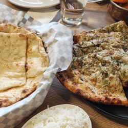 4 Seasons Chaat House - Naan and Keema naan with sauce on the side