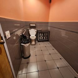 Joy Dumpling - Joy Dumpling - restroom; there is no diaper changing area in the bathroom but can use the cabinet in the back corner in a pinch