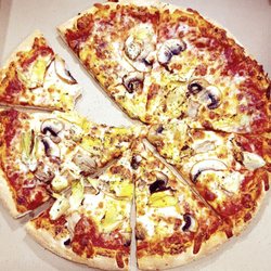 Eatz Pizzeria & Deli - 12" $23+ pizza with artichoke hearts, garlic, double basil & double mushrooms. Very little toppings & no basil at all.