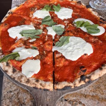 Pizzeria Picco - The Devinci: spicy marinara, buffalo stracciatella cheese, fresh garlic, basil, sea salt. - Pizza Near Me - Larkspur, California Pizzeria Picco - The Devinci: spicy marinara, buffalo stracciatella cheese, fresh garlic, basil, sea salt. - Pizza Near Me - Larkspur, California
