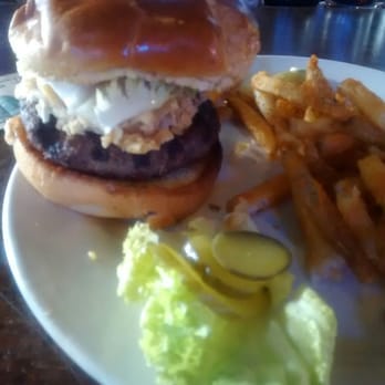 The Phoenix - $6 burger Wed. special build a burger, very good but next time ill get it without the GIANT onion ring - New American Near Me - Kansas City, Missouri