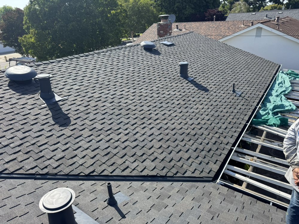 Slide of E & E Roofing