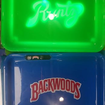 Fruitvale Smokeshop - These are rolling trays. The top one is lit up. You can have it on your lap...I guess...and you could roll a bunch of joints - Head Shops Near Me - Oakland, California