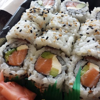 Sunshine Sushi - a tray of sushi with salmon and avocado - Sushi Bars Near Me - Columbia, Missouri Sunshine Sushi - a tray of sushi with salmon and avocado - Sushi Bars Near Me - Columbia, Missouri