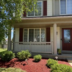 Mystic Lawn Care - Red mulch installation