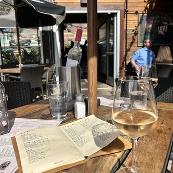 Café Benelux - Bottle of Rose, upstairs on a beautiful day - Belgian Near Me - Milwaukee, Wisconsin