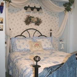 Restful Nest on the Rogue - Blue Room has double size bed, lots of antiques, view of forest and water feature.