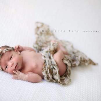1. Newborn Love Photography