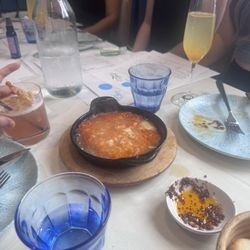 Elia - Saganaki $17.00+ Skillet-fried flaming kefalothiri cheese, brandy,lemon
