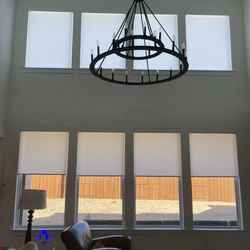 Texas Windows - Great room with 8 power programmable roller shades in Esther white.