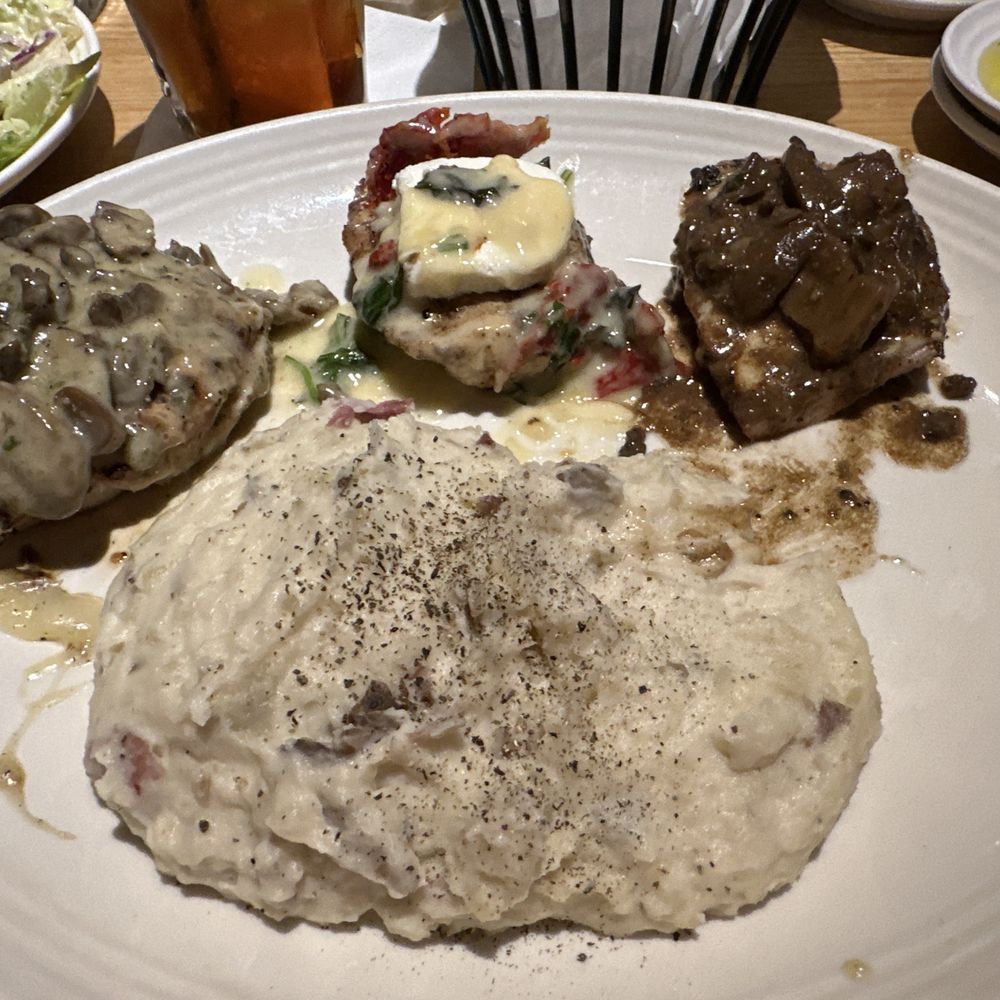 Carrabba's Italian Grill - Trio Chicken, Chicken Marsala, Polla Rosa Maria and Chicken Bryan with garlic mashed potatoes. - Italian Near Me - Macon, Georgia Carrabba's Italian Grill - Trio Chicken, Chicken Marsala, Polla Rosa Maria and Chicken Bryan with garlic mashed potatoes. - Italian Near Me - Macon, Georgia