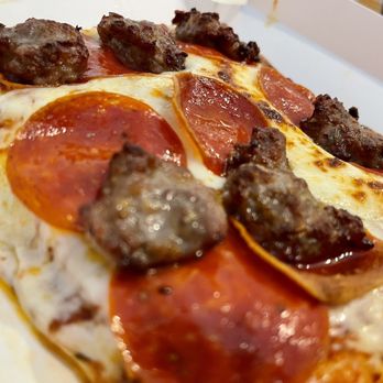 Rocky Rococo - Sausage & Roni Super Slice - Pizza Near Me - Whitewater, Wisconsin Rocky Rococo - Sausage & Roni Super Slice - Pizza Near Me - Whitewater, Wisconsin