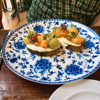 Oakleaf - Griddled sourdough with goat cheese and roasted heirloom cherry tomatoes - New American Near Me - Carrboro, North Carolina
