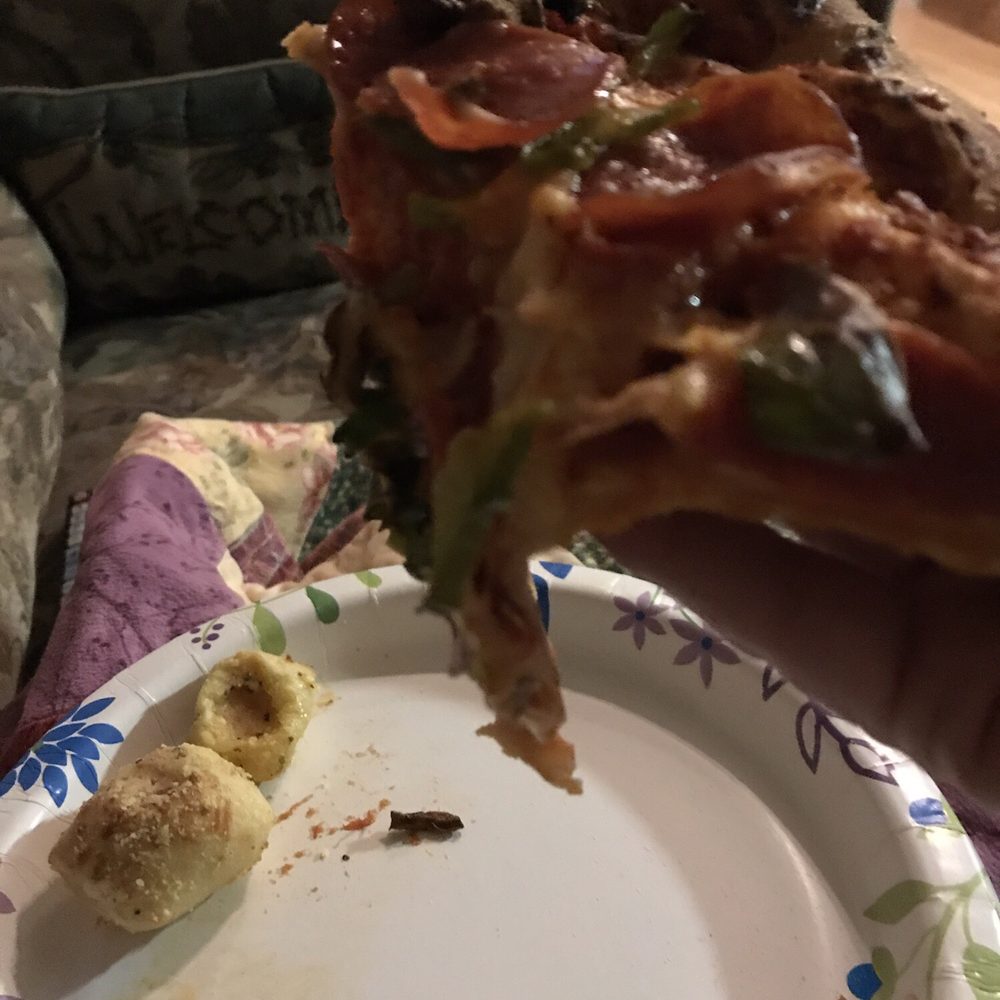 It's a sad attempt at an original crust, 3-topping pizza.
