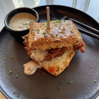 Mariposa - A luxurious smothered chicken biscuit - Tapas/Small Plates Near Me - Charlotte, North Carolina
