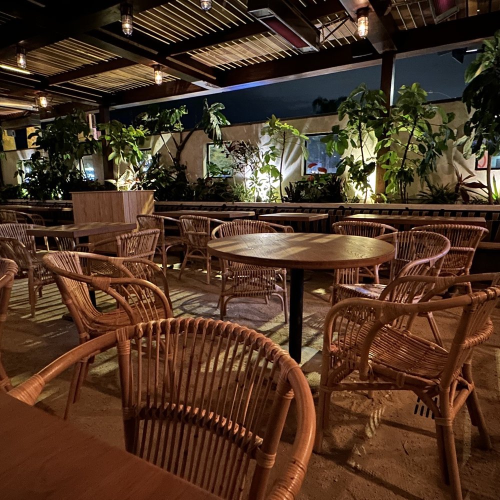 Gin Rummy - Patio area has great tiki tulum vibes - Cocktail Bars Near Me - Marina del Rey, California