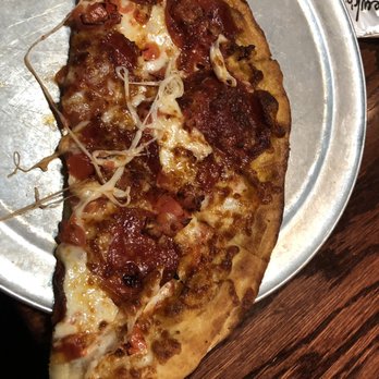 Newk's Eatery - My pepperoni pizza!! On the lighter side I was starving so I ate some of it. - Pizza Near Me - Brandon, Mississippi