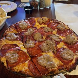 Sausage/pepperoni Ninos Almost Famous Pizza Burger