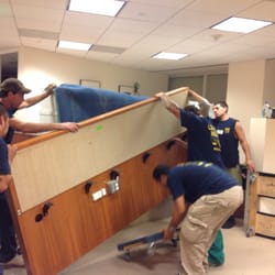 Low Cost Movers - Movers doing a office move.