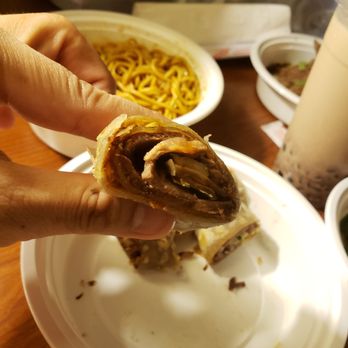Everyday Noodles - Onion pancake roll with slice beef. Overpriced for what it's worth. The one in vegas was triple in size for a $1 more... - Chinese Near Me - Pittsburgh, Pennsylvania Everyday Noodles - Onion pancake roll with slice beef. Overpriced for what it's worth. The one in vegas was triple in size for a $1 more... - Chinese Near Me - Pittsburgh, Pennsylvania