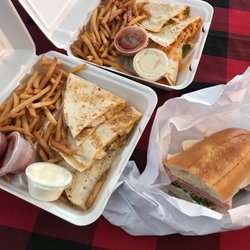 Frankie T's Kitchen And Catering - Loaded baskets of quesadillas and delicious Italian combo (half eaten by me) all for under 25$ ..the picture doesn't do it all justice ..