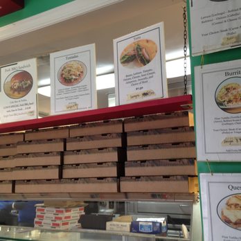 Ciao Bella Pizzeria - a display of pizzas - Pizza Near Me - Chapel Hill, North Carolina