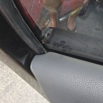Jet Black Tint - The bottom corner the film is loose could easily tear - Car Window Tinting Near Me - Richmond, California Jet Black Tint - The bottom corner the film is loose could easily tear - Car Window Tinting Near Me - Richmond, California