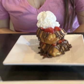 Just Love Coffee Cafe - Georgetown - Nutella Stuffed waffles! Mmmmm so good! Highly recommend this dish if you're a Nutella lover! - Coffee & Tea Near Me - Georgetown, Texas Just Love Coffee Cafe - Georgetown - Nutella Stuffed waffles! Mmmmm so good! Highly recommend this dish if you're a Nutella lover! - Coffee & Tea Near Me - Georgetown, Texas