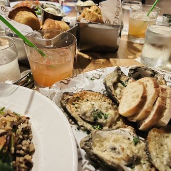 Ulele - Charbroiled Oysters Karson's Jalapeno Corn Beer Muffins, Native Saute - New American Near Me - Tampa, Florida Ulele - Charbroiled Oysters Karson's Jalapeno Corn Beer Muffins, Native Saute - New American Near Me - Tampa, Florida