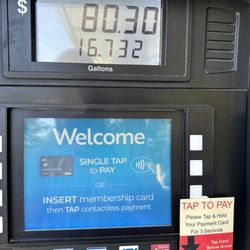 Costco Gas Station - Poured out a little liquor because it wasn't even on E.