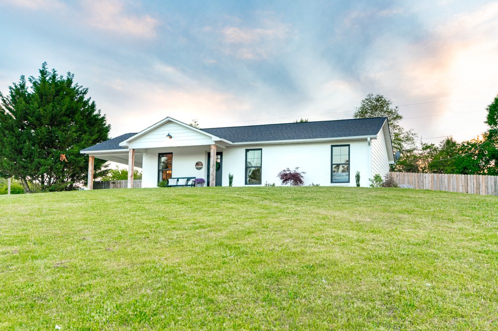 Slide of Traditions Roofing & Construction