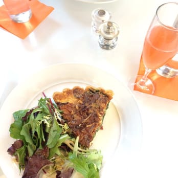 Kafe Leopold - Brunch quiche with bacon, spinach, and Gruyere. Plus a blood orange mimosa. Delicious! - Austrian Near Me - Washington, DC, District of Columbia Kafe Leopold - Brunch quiche with bacon, spinach, and Gruyere. Plus a blood orange mimosa. Delicious! - Austrian Near Me - Washington, DC, District of Columbia