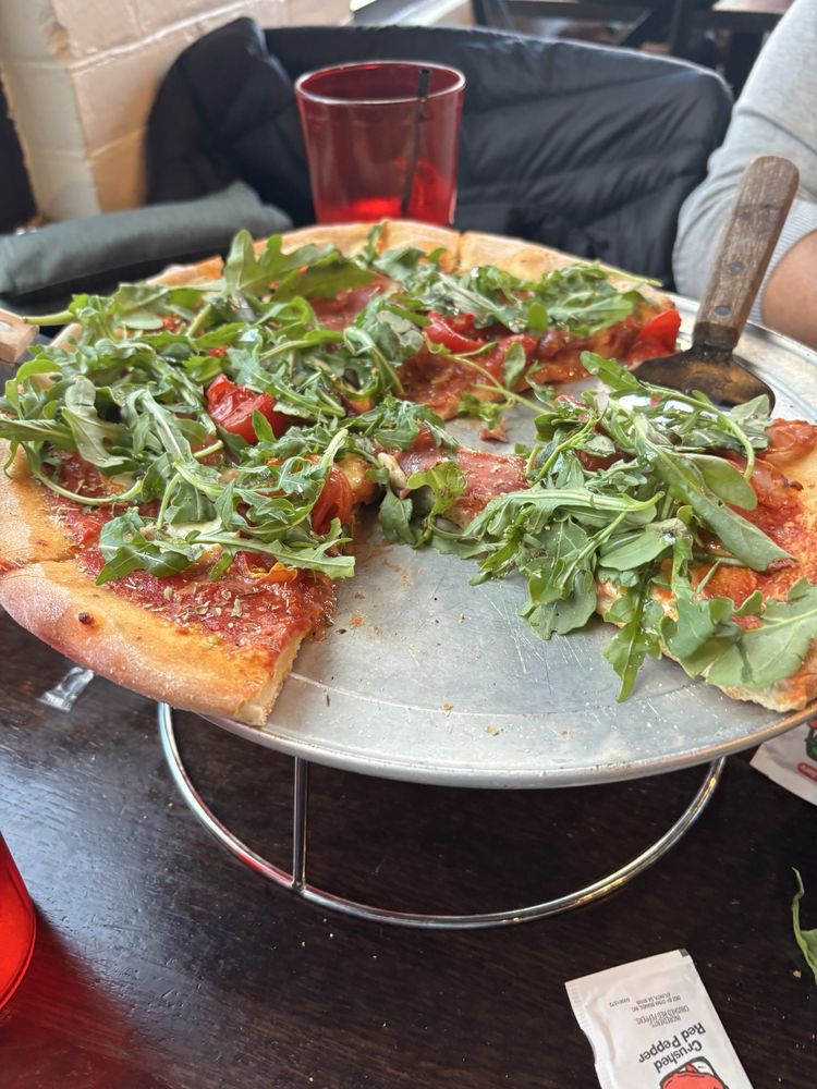 The Pizza Slice Logo