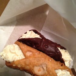 Carmellas Italian Deli & Pastries - Chocolate and regular cannoli's in the pink box of happiness.